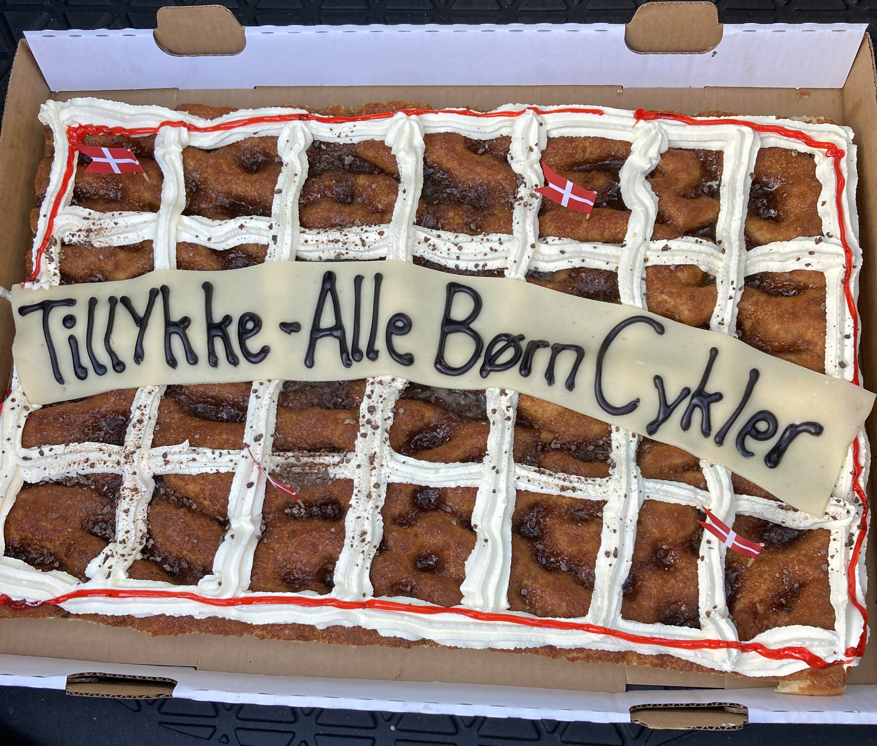 Kagemand med teksten: Alle børn cykler